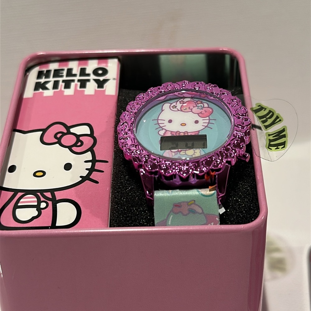 Hello Kitty Little Girl’s Digital Wrist Watch w/blue & Pink band and Pink Face.